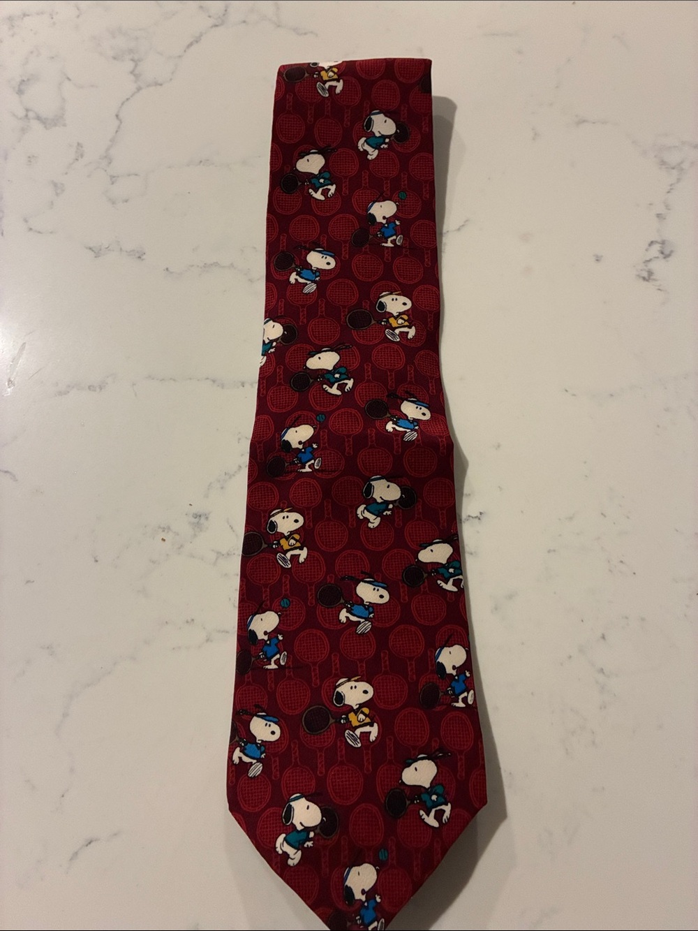 Peanuts Snoopy tennis Men's Tie maroon/burgandy type of color.